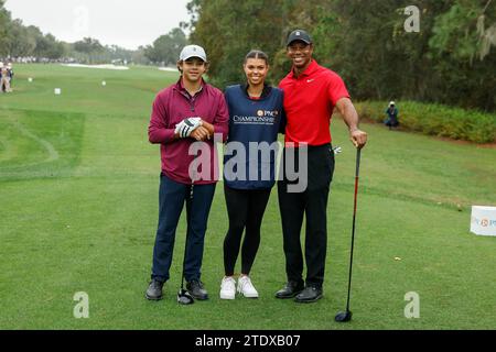 Tiger Woods (r), His Daughter, Sam Woods (c), And His Son, Charlie 