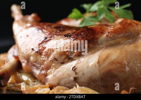 Tasty cooked rabbit meat with vegetables, closeup Stock Photo