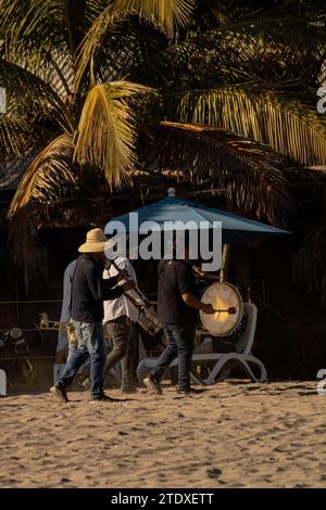 Sun-kissed moments: Vibrant scenes unfold on the beaches of Nayarit as the sun bathes the lively atmosphere. Stock Photo