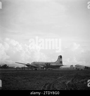 The Douglas C-54 Skymaster of the Dutch government at Kemajoran airfield near Jakarta. The aircraft bears the inscription Netherlands Government Air Transport ca. February 1946 Stock Photo