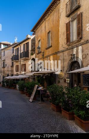 Orvieto, Italy - 18 November, 2023: idyllic old town alley in downtown Orvieto Stock Photo