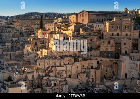 Matera, Italy - 26 November, 2023: view of the old city center of Matera with the stone houses in the last rays of sunlight Stock Photo