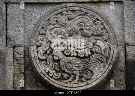 medallion in the penataran temple with animal reliefs. Stock Photo