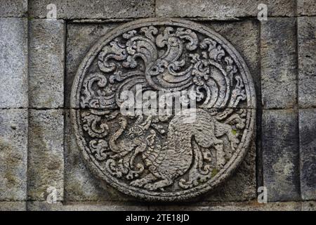 medallion in the penataran temple with animal reliefs. Stock Photo