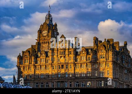 The Balmoral Hotel at sunset in city of Edinburgh in Scotland, UK. Five star hotel luxury accommodation at Princes Street, Rocco Forte Hotels group. Stock Photo