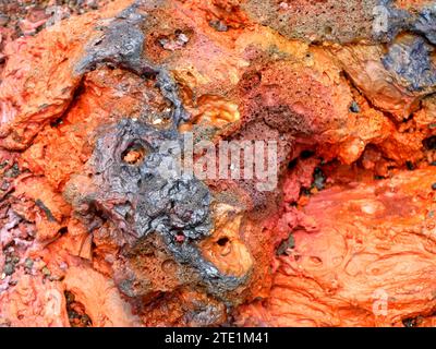 Colorful volcanic rocks and rough texture in Dolomieu, Fournaise volcano, Reunion, France Stock Photo