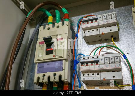 Three-phase 400 ampere circuit breaker in a metal wiring box Stock Photo