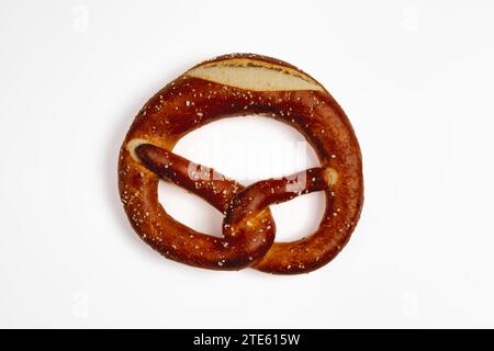 German pretzel with salt isolated on white background. Stock Photo