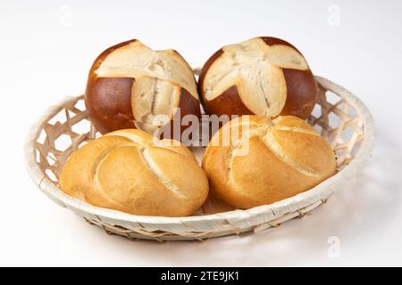 German Rolls in a breakfast basket on White Background Stock Photo