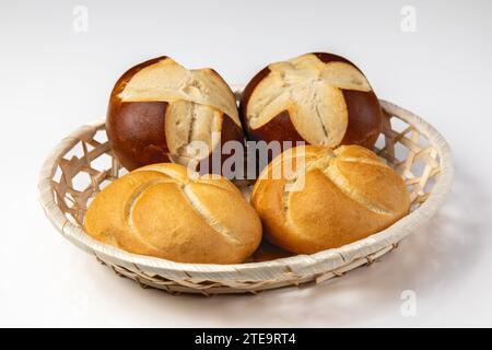 German Kaiser Rolls and Pretzel Rolls in a basket Stock Photo