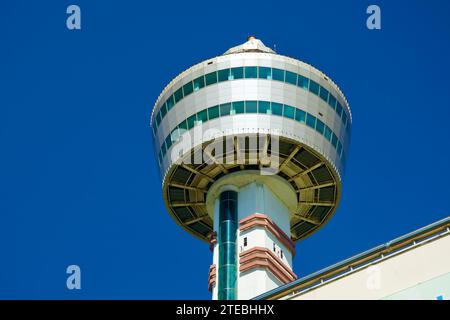 Guri City, South Korea - September 30, 2023: A close-up view from below of Guri Tower's two observation decks, showcasing its panoramic windows and el Stock Photo