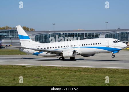 White and blue unbranded passenger aircraft taking off. No trademark ...