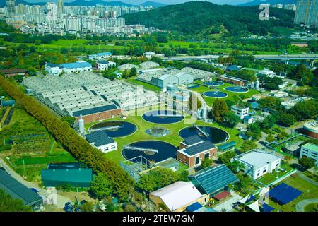 Guri City, South Korea - September 30, 2023: Gazing down from Guri Tower, the water treatment processing facility is visible, its circular clarifier p Stock Photo