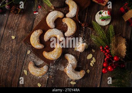 Holiday Almond crescent shortbread cookies on festive background, selective focus Stock Photo