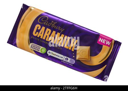 Bar of Cadbury Caramilk chocolate bar isolated on white background - golden caramel chocolate Stock Photo