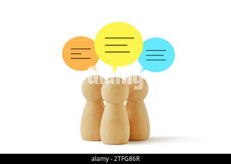 Group of wooden pawns with speech bubbles - Concept of network and communication Stock Photo