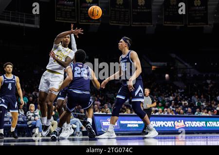 Citadel guard Keynan Davis (22) falls backwards as the ball goes ...