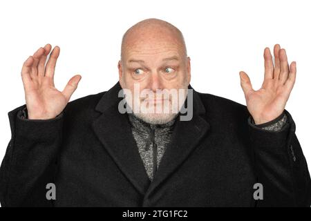 Mature Man in Distress: Emotional 58-Year-Old with a Winter Coat Stock Photo