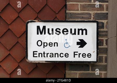 signpost pointing way to museum, Steyning, West Sussex, England, Great Britain Stock Photo