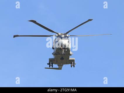RNAS Merlin helicopter with blue sky background Stock Photo