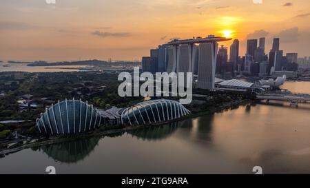 Aerial view Singapore city landscape skyline and skyscraper at sunset Stock Photo