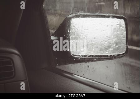 rain drops on  the rear view mirror Stock Photo