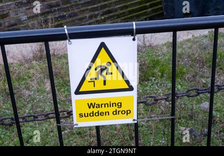 Warning sudden drop sign Liverpool Stock Photo