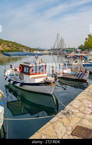 Fishing boats moored in the harbour of Vathi on the island of Meganisi in the Ionian Sea Stock Photo