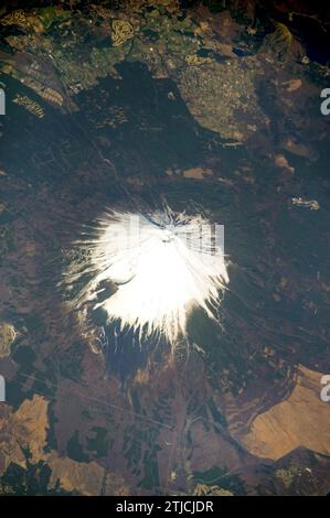 Mount Fuji, Japan is featured in this image photographed by an Expedition 19 crew member on the International Space Station in April 2009. The 3,776 meters high Mount Fuji volcano, located on the island of Honshu in Japan, is one of the world's classic examples of a stratovolcano. Stock Photo
