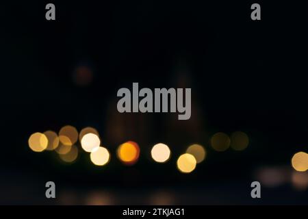 Festive bokeh lights on black background. Christmas concept. Stock Photo