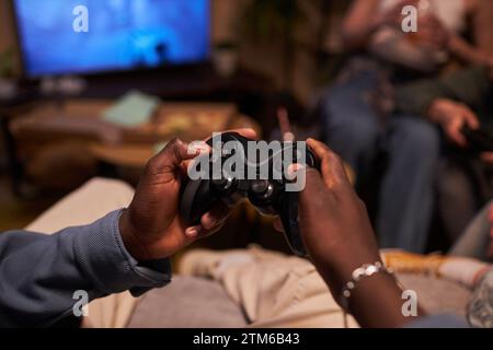 Game Controller in Male Hands Stock Photo