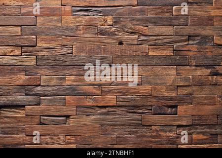 brown pieces of planks lined with wood wall panel. wood background Stock Photo