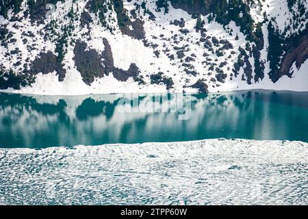 Pristine Garibaldi reflects the transition from winter to spring Stock Photo