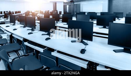 Group of computers neatly placed in a lab Stock Photo