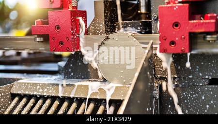 Closeup of a CNC machine at work cutting steel Stock Photo