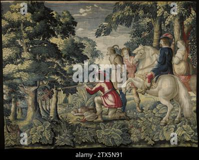 Duck hunt, Maximiliaan van der Gucht, c. 1650 Wall carpet with duck hunt. A kneeling hunter, dressed in red, fires with a musket on a left of a swamp with dods flying up duck. On the right on a prancing fungus is a hunter with beard. He is dressed in blue. Behind him there are two men with a duck in his hand. On the right an Amazon on horseback with falcon on the hand. A horizontal dog monitors a shot duck. The scene was seen in a forest landscape with see -through in the middle and with high trees on the sides, while the foreground is filled with large -leaf flowering plants, including rose, Stock Photo