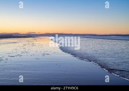 Dusk in winter over Findhorn Beach at low tide. Findhorn, Morayshire, Scotland. Stock Photo