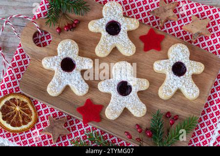 christmas bakery biscuits Spitzbuben with red jam Stock Photo