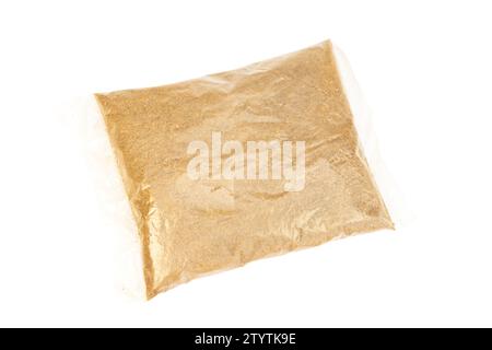 Neem cake powder fertilizer in small pack isolated on white background Stock Photo