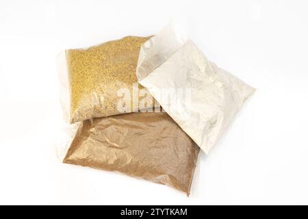 Organic fertilizer bonemeal, mustard cake and neem fertilizers isolated on white background Stock Photo
