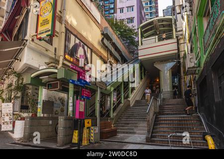 December 12, 2023: Central Mid Levels escalator and walkway system located in Hong Kong, China, is the longest outdoor covered escalator system in the Stock Photo