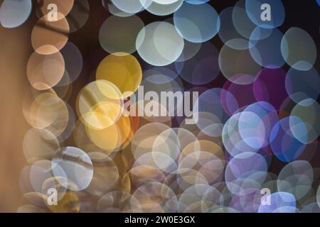 Abstract defocused bokeh balls background. Colorful round specular highlights. Stock Photo