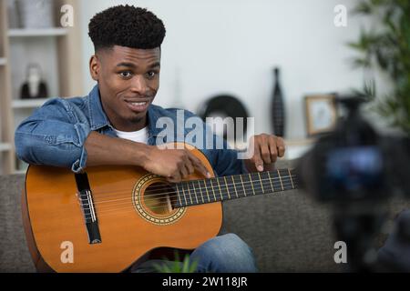 handsome man recording song - vlogging concept Stock Photo