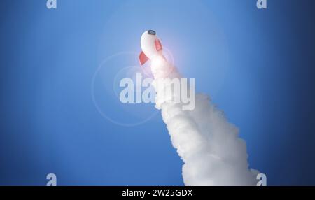 White rocket at high speed flies into space against Stock Photo