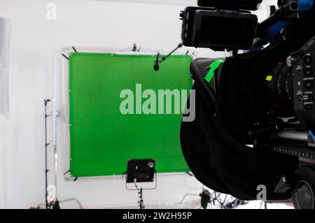 Setup in a TV studio with green screen, lights, and camera Stock Photo ...