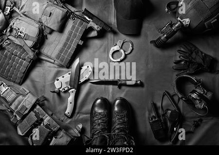 Military equipment or special agent gear concept flat lay background with copy space. Mixed media Stock Photo