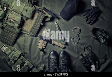 Military equipment or special agent gear concept flat lay background with copy space. Mixed media Stock Photo