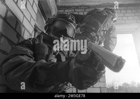 Swat team action Black and White Stock Photos & Images - Alamy
