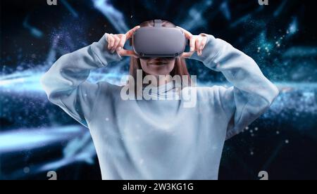 Image of a girl in VR glasses. Innovative technologies. Business concept. Mixed media Stock Photo