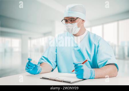 The doctor looks at the jar of pills and writes out a prescription. Medicine concept. Mixed media Stock Photo